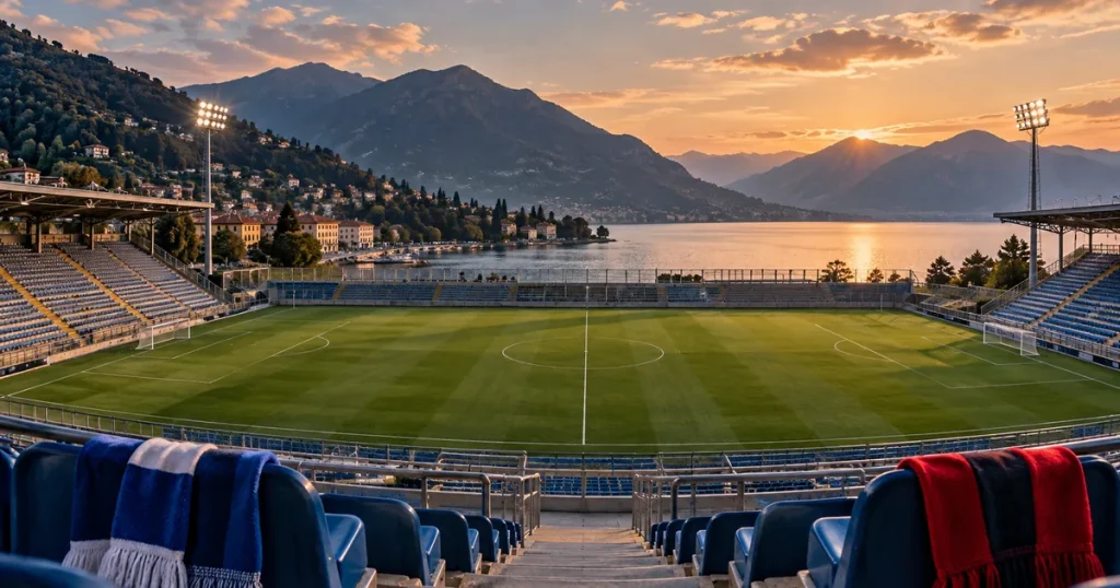 Illustrazione AI di uno stadio calcistico sul lago, senza giocatori né loghi; copertina del Como-Venezia.